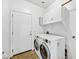 Bright laundry room with washer and dryer hookups at 1724 S Rockwell St, Gilbert, AZ 85295