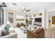 Virtually staged living room with fireplace and built-ins at 1724 S Rockwell St, Gilbert, AZ 85295