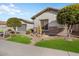 Front yard view of a charming house with attractive landscaping and stone accents at 27078 W Yukon Dr, Buckeye, AZ 85396