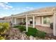 Relaxing backyard patio area with pergola and seating area at 27078 W Yukon Dr, Buckeye, AZ 85396