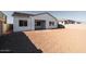 Home's backyard featuring a covered patio and ample space ready for landscaping and personalization at 1296 E Coconino Way, Gilbert, AZ 85298