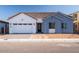 Charming single-Gathering home with a two-car garage, manicured lawn, and inviting front entrance at 1296 E Coconino Way, Gilbert, AZ 85298