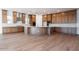 Elegant kitchen with stainless steel appliances, a center island, and light wood cabinets at 1296 E Coconino Way, Gilbert, AZ 85298
