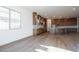 Open-concept kitchen with stainless steel appliances, custom cabinets, and plenty of counter space at 1296 E Coconino Way, Gilbert, AZ 85298