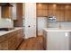 Well-appointed kitchen with granite countertops, stainless steel appliances, and ample storage space at 1296 E Coconino Way, Gilbert, AZ 85298