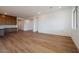 Spacious open-concept living room boasts sleek hardwood floors and recessed lighting at 1296 E Coconino Way, Gilbert, AZ 85298