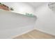Clean storage room featuring a shelf with items for your home at 17917 W Amberwood Dr, Goodyear, AZ 85338