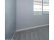 Bedroom features carpet, gray walls, white baseboards, and window at 1284 E Coconino Way, Gilbert, AZ 85298