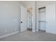 Bedroom with neutral walls and a closet with doors at 1284 E Coconino Way, Gilbert, AZ 85298