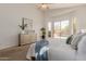 Alternate angle of the spacious main bedroom that includes sliding glass door and pool views at 3055 N Red Mtn # 77, Mesa, AZ 85207