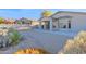 Landscaped backyard with gravel and desert plants at 4336 S Pony Rider Trl, Gold Canyon, AZ 85118