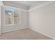 Bright bedroom with neutral wall colors and carpeted floor at 4336 S Pony Rider Trl, Gold Canyon, AZ 85118