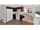 View of kitchen with white appliances and ample counter space at 4336 S Pony Rider Trl, Gold Canyon, AZ 85118