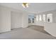 Bright living room with large window and tile flooring at 4336 S Pony Rider Trl, Gold Canyon, AZ 85118