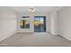 Main bedroom with sliding door to backyard and ceiling fan at 4336 S Pony Rider Trl, Gold Canyon, AZ 85118