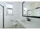 Bathroom featuring a modern sink and walk-in shower at 1300 E Penedes Dr, Gilbert, AZ 85298