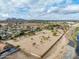 Wide community aerial view of neighborhood with desert landscaping, parks, and mountain views at 1017 E Grandview Rd, Phoenix, AZ 85022