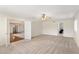 Comfortable bedroom featuring plush carpeting and an open doorway at 1017 E Grandview Rd, Phoenix, AZ 85022