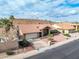 Charming single-story home featuring a tile roof, two-car garage, and low-maintenance desert landscaping at 1017 E Grandview Rd, Phoenix, AZ 85022