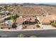 Charming single-story home featuring a tile roof, two-car garage, and low-maintenance desert landscaping at 1017 E Grandview Rd, Phoenix, AZ 85022