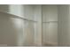 Bright walk-in closet with double hanging rods at 11465 E Utah Ave, Mesa, AZ 85212