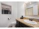 Cozy bathroom with granite countertop, vanity, and sink at 22364 N 67Th Dr, Glendale, AZ 85310