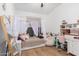 Stylish bedroom featuring a canopy bed, wood floors, and a cozy, personalized decor at 22364 N 67Th Dr, Glendale, AZ 85310