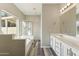 Bright bathroom featuring double vanity, soaking tub and walk-in shower at 6658 E San Cristobal Way, Gold Canyon, AZ 85118