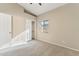 Cozy bedroom featuring neutral carpeting, a standard closet, and a window providing a view of the neighborhood at 6658 E San Cristobal Way, Gold Canyon, AZ 85118