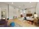 Large bedroom with modern decor, recessed lighting, sitting area and a large window at 7928 E Parkview Ln, Scottsdale, AZ 85255