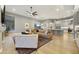 Open concept living space with modern decor including a kitchen, seating area, and dining space at 7928 E Parkview Ln, Scottsdale, AZ 85255