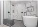 Spa-like bathroom with a freestanding tub and a large walk-in shower at 9027 N 82Nd St, Scottsdale, AZ 85258