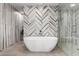Elegant bathroom featuring a freestanding bathtub and a large walk-in shower at 9027 N 82Nd St, Scottsdale, AZ 85258