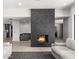 Stunning marble fireplace as a focal point in the living room at 9027 N 82Nd St, Scottsdale, AZ 85258