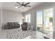 Relaxing living room with sliding glass doors leading to backyard at 9027 N 82Nd St, Scottsdale, AZ 85258