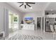 Comfortable living area with a large TV and access to the patio at 9027 N 82Nd St, Scottsdale, AZ 85258