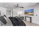 Main bedroom with a large TV, comfy seating, and ensuite bathroom at 9027 N 82Nd St, Scottsdale, AZ 85258