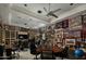 Spacious gym featuring exercise equipment, sports memorabilia, display shelving and modern lighting at 19481 N 98Th Pl, Scottsdale, AZ 85255