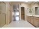 Bathroom featuring a vanity with sink, glass shower and tile floor at 17316 N Inca Pl, Surprise, AZ 85374