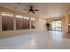 Bright dining area with tile floors and access to the backyard at 41515 N Chase Oaks Way, Anthem, AZ 85086