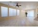 Bright dining room with tile floors and large windows at 41515 N Chase Oaks Way, Anthem, AZ 85086