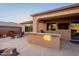 Outdoor kitchen with granite countertop and built-in grill at 41515 N Chase Oaks Way, Anthem, AZ 85086