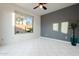 Pool house room with large window and view of the backyard at 41515 N Chase Oaks Way, Anthem, AZ 85086