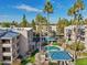 Aerial view of apartments with a beautiful pool area and lush landscaping at 5122 N 31St Way # 244, Phoenix, AZ 85016
