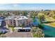 Scenic aerial view of building with lake and golf course views with a convenient parking area at 5122 N 31St Way # 244, Phoenix, AZ 85016