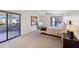 Bedroom featuring neutral color palette, ceiling fan, balcony access and views at 5122 N 31St Way # 244, Phoenix, AZ 85016