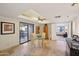 Dining room with a glass table, ceiling fan, and sliding door to outdoor space at 5122 N 31St Way # 244, Phoenix, AZ 85016