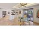 Dining room featuring a glass table and chairs next to sliding doors leading to a balcony at 5122 N 31St Way # 244, Phoenix, AZ 85016