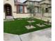 Well-manicured lawn and landscape design enhance the curb appeal of this beautiful, two-story home at 5819 N 88Th Ln, Glendale, AZ 85305