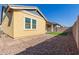 Home exterior showcasing light yellow siding and landscaping at 4287 E Clifton Ave, Gilbert, AZ 85295